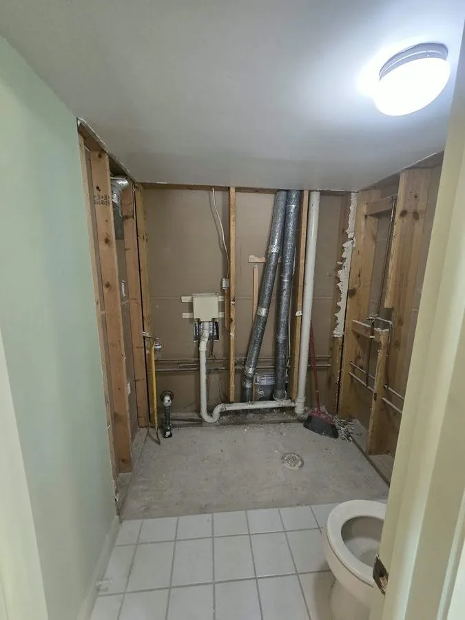 Bathroom stripped back to the studs before waterproofing goes in